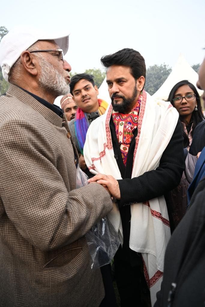 Our family elder meeting the Union Cabinet Minister for Food Processing Industries at a Kashmiri saffron growers' event