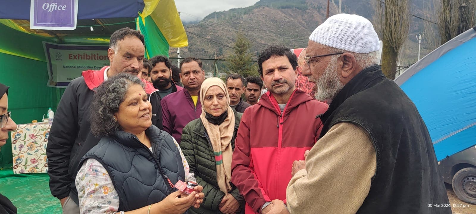 Our family elder talking with visitors at a Kashmir saffron exhibition, March 2024