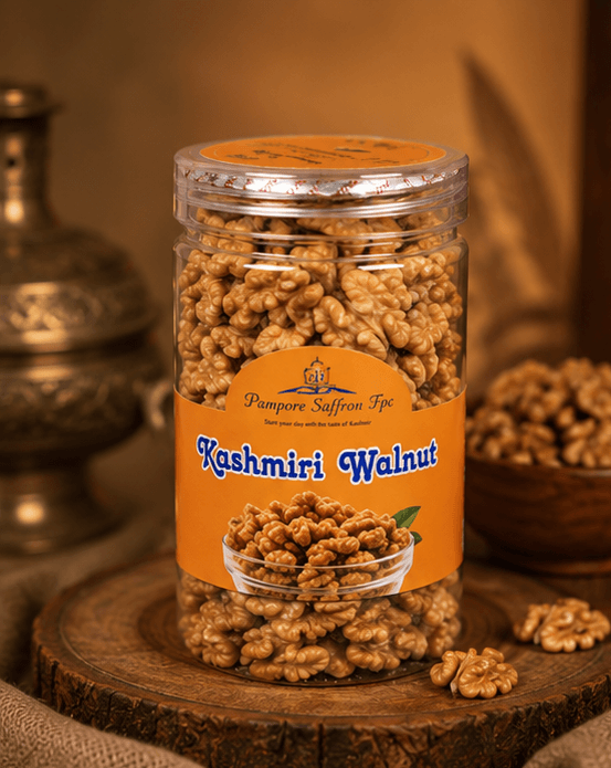 A clear jar labelled Kashmiri Walnut, packed with pale walnut halves, standing on a wooden slice