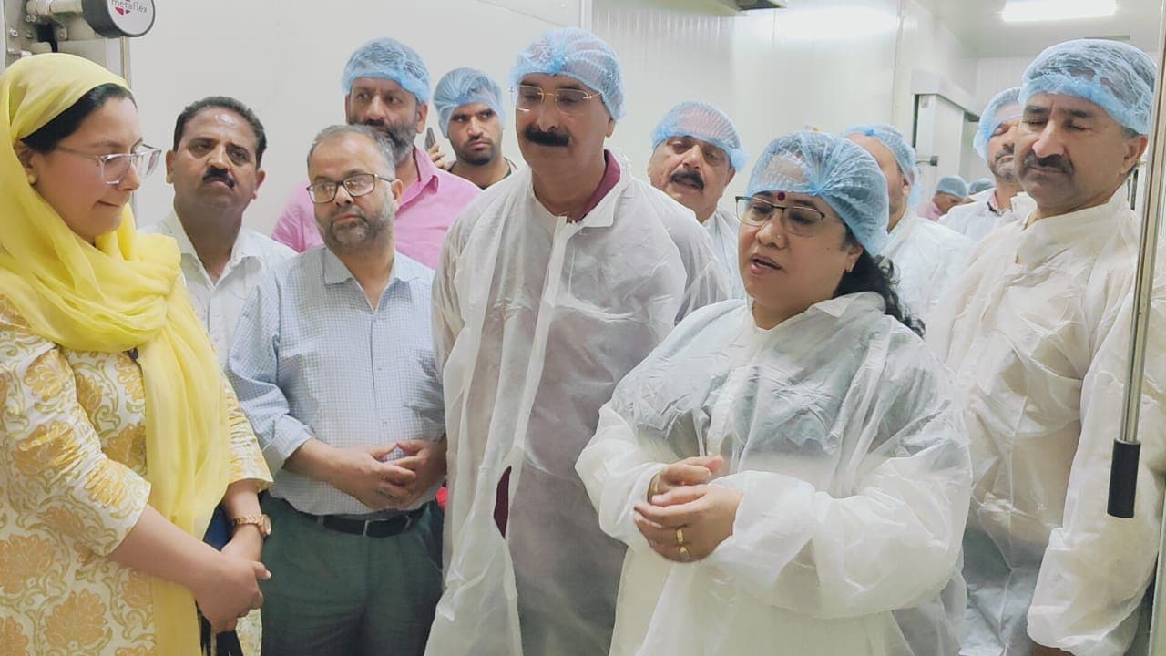 Directorate of Agriculture officials inspecting a Kashmiri saffron facility — the verification behind GI certification