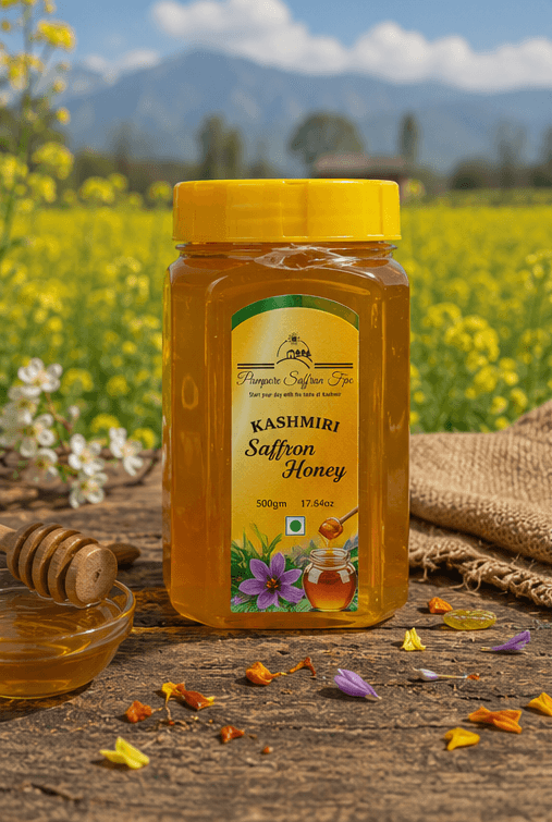 The saffron honey jar outdoors on a weathered plank, a mustard field and the Kashmir mountains behind it